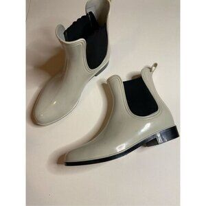 White and black rain boots